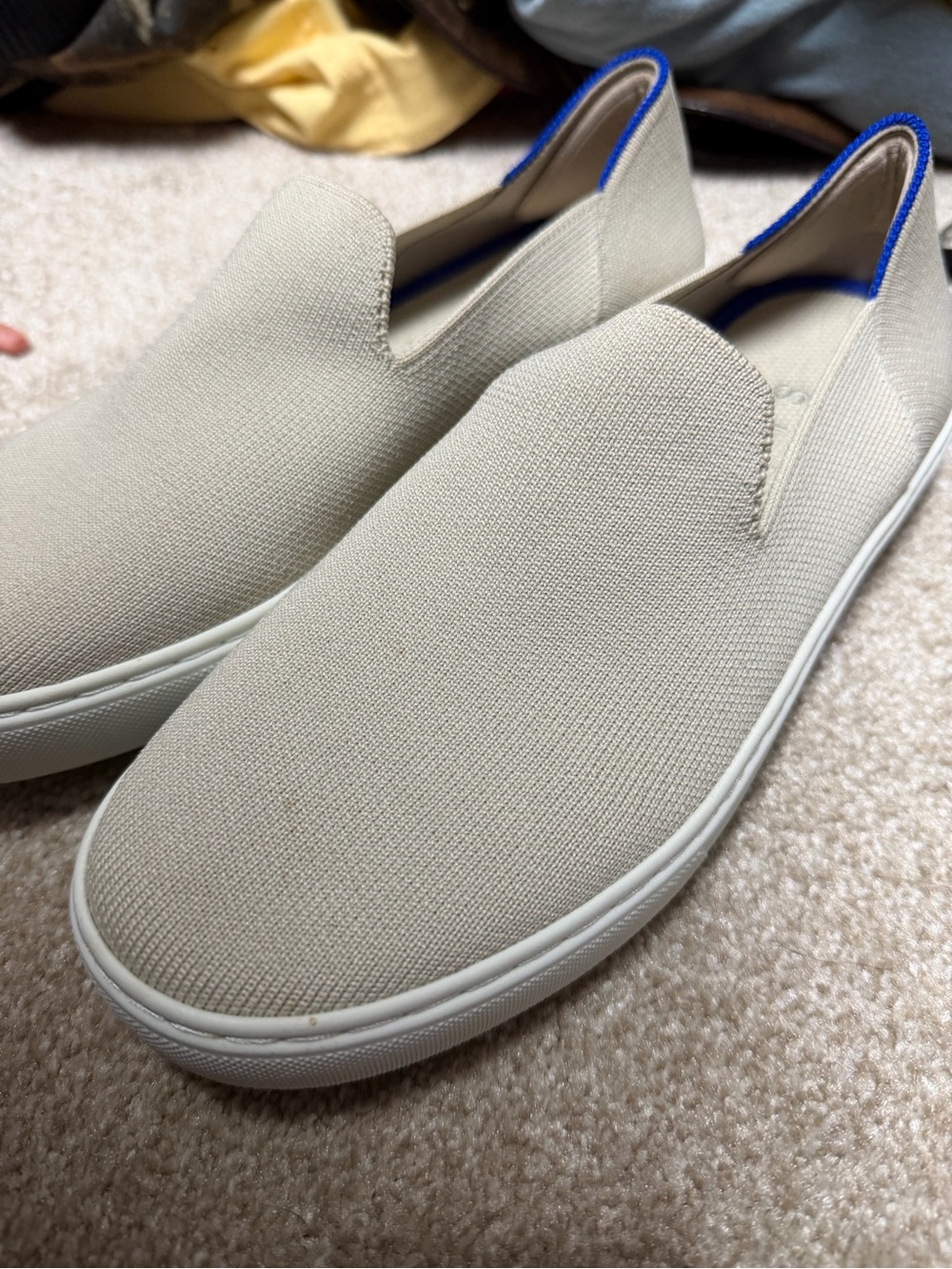 Rothy's Slip-On Sneakers in Light Beige with Blue Trim